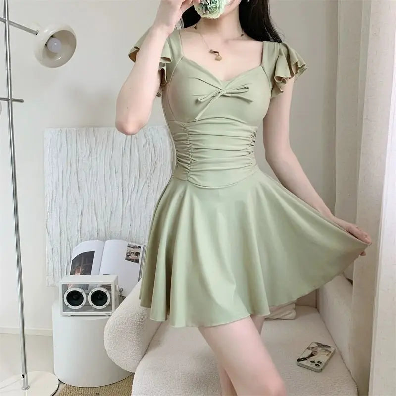 2026 New Women Skirted Swimdress Short Sleeve Tummy Control Swimsuit With Padding Slimming Hot Spring Bathing Suit Kent Store
